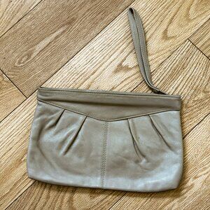 Light tan/taupe-color, real leather, envelope-style clutch purse with handle
